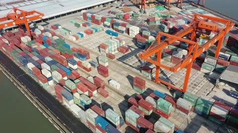 Container terminal with solar panels on factroy rooftop Stock Footage 166387492
