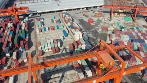 Container terminal with solar panels on factroy rooftop Stock Footage 166387642
