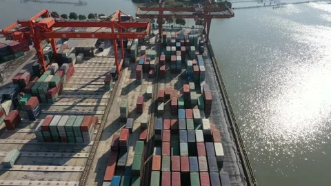 Container terminal with solar panels on factroy rooftop Stock Footage 166387800