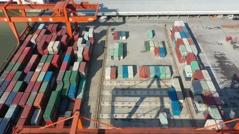 Container terminal with solar panels on factroy rooftop Stock Footage 166387964