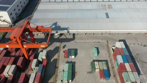 Container terminal with solar panels on factroy rooftop Stock Footage 166388031
