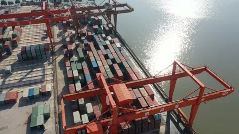 Container terminal with solar panels on factroy rooftop Stock Footage 166388069