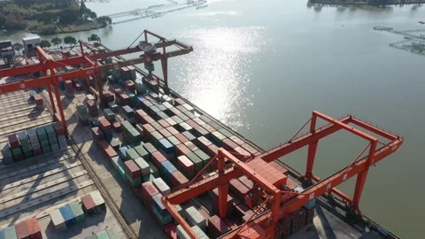 Container terminal with solar panels on factroy rooftop Stock Footage 166388163