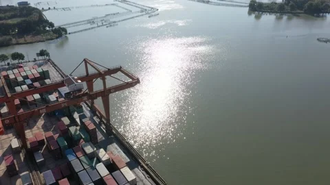 Container terminal with solar panels on factroy rooftop Video stock 166388175
