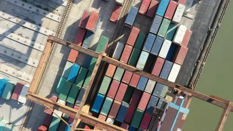 Container terminal with solar panels on factroy rooftop Stock Footage 166388305