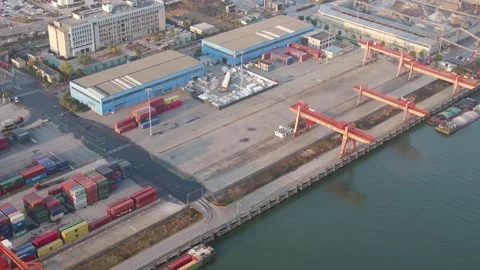 Container terminal with solar panels on factroy rooftop Stock Footage 167226459