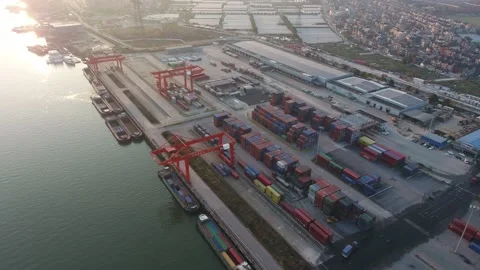 Container terminal with solar panels on factroy rooftop Stock Footage 167226615