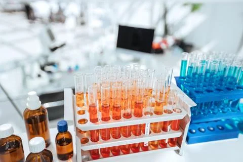 Container with test tubes on the table in the laboratory. Stock Photos