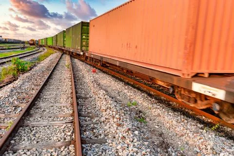 Container train that is moving out of the loading and unloading station to th Stock Photos