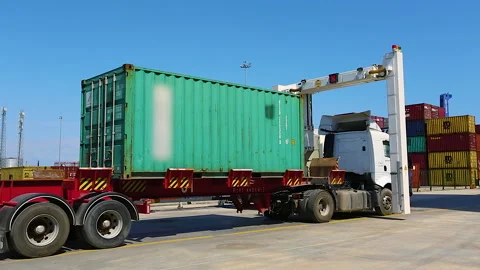 Container truck passing through x ray machine at the trading port. Video stock 144380920