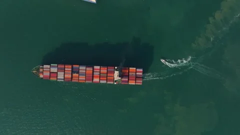 Container vessel navigating open waters for transport, Thailand Stock Footage 303497702