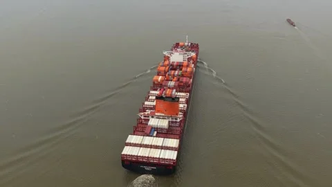 Container vessel seen from above transporting goods across open ocean Stock Footage 320246090