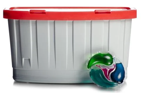 Container washing laundry capsules Stock Photos