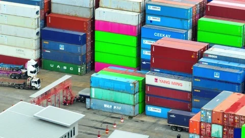 Container yard from above: A bustling hub of stacked containers. Stock Footage 249728234