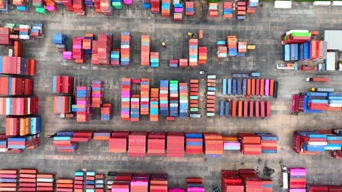 Container yard from above: A bustling hub of stacked shipping containers. Stockbeeldmateriaal 249728607