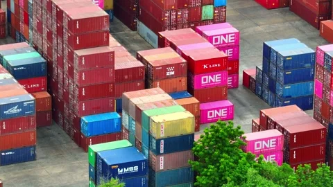Container yard, organized stacks of shipping containers. Stockbeeldmateriaal 249728295
