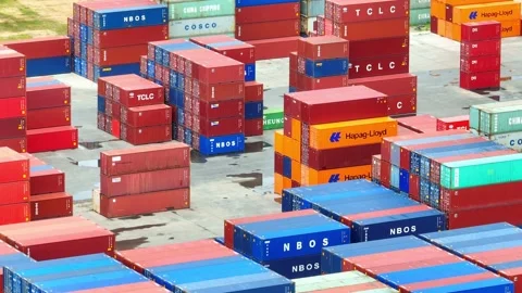 Container yard, organized stacks of shipping containers. Stock Footage 249728513