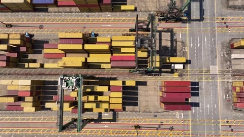 Container yard shows numerous stacked cargo containers 库存影片 335412917