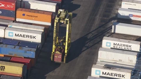 Containers and straddle carrier. Generic port activety. From Helicopter Stock Footage 61436857