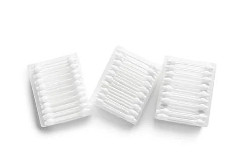 Containers with cotton buds on white background Stock Photos