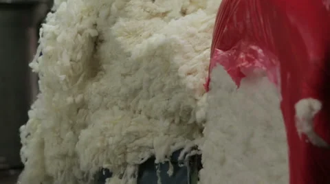 Containers of dye'd wool ready to be made into yarn in a Harris Tweed factory Stock Footage 58495727