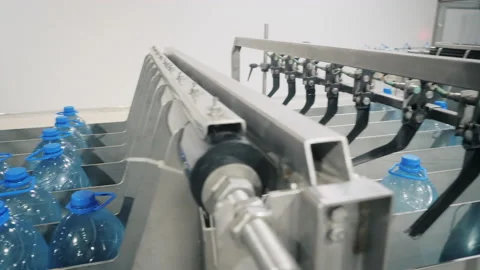 Containers full of water at automatic sorting machine Stock Footage 162095573