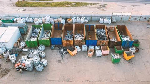 Containers from a height with different types of metal, Sorting for remelting Stock Photos