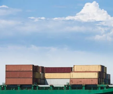Containers loaded on a cargo ship Stock Photos