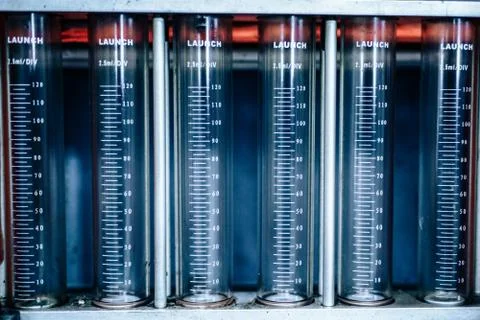 Containers with a scale in the device Stock Photos