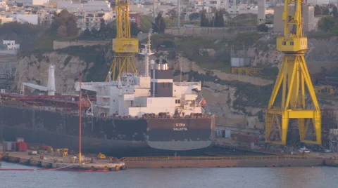 A Containers Ship embarked in Valletta's Harbor Malta Stock Footage 65389661