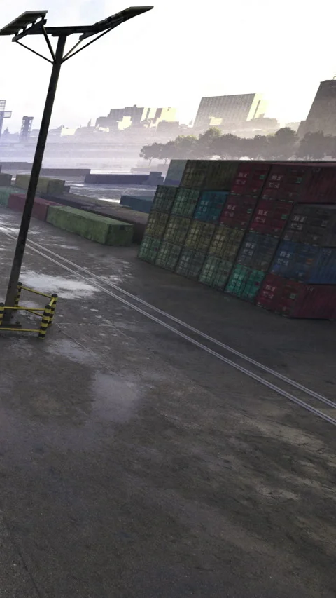 Containers stacked high at a busy shipping yard under a misty sky Stock Footage 331697511