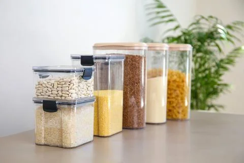 Containers for storing bulk products in the kitchen. Stock Photos
