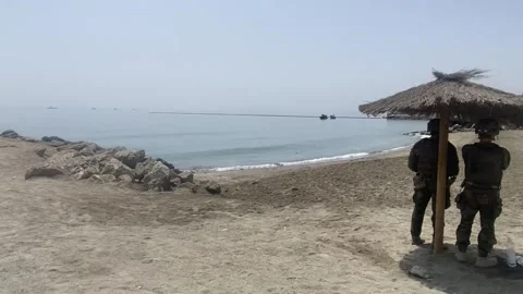 Containment barriers installed on Ceuta beach, Ceuta, ES - 01 Aug 2026 Stock Footage 341145543