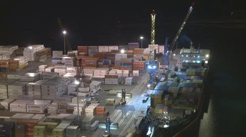 Containship loading at night Stock Footage 1340577