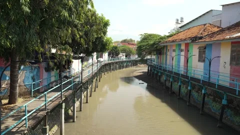 Contaminated River Canals Flowing Through Residential Area In Banyuwangi, East Stock Footage 333800815