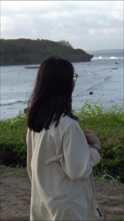 Contemplating the Ocean at Sunset Stock Footage 283207069
