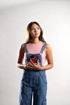 Contemplating While Holding Mobile Phone Stockfoto's