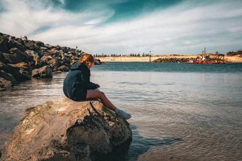 Contemplation by the Harbor Stock Photos