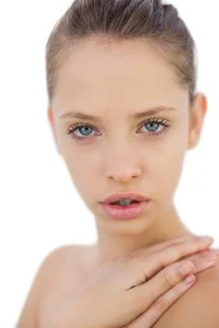 Contemplative brunette model looking at camera Stock Photos