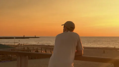 Contemplative Evening by the Ocean at Sunset, Full of Beauty and Tranquility Vídeos de archivo 295994171