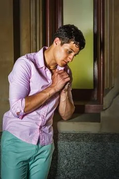 Contemplative Moment by the Window. Stock Photos