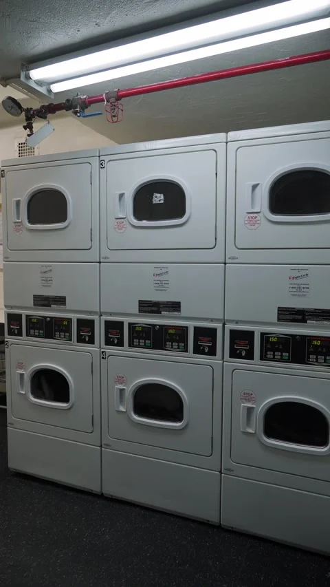 A Contemporary and Efficient Modern Laundry Facility Featuring Convenient Stock Footage 295731272