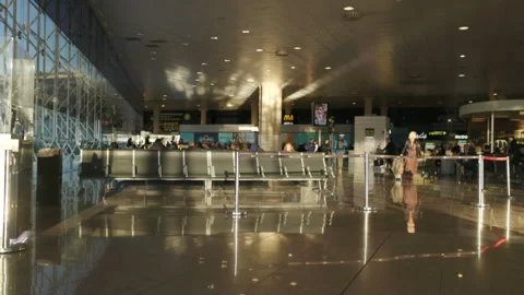 Contemporary and Elegant Interior Design of an Airport Terminal with Sunlight Stock Footage 295799675