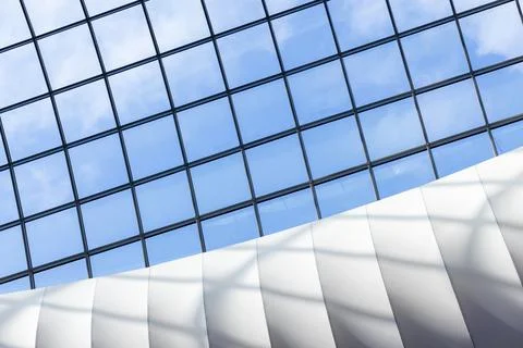 Contemporary architectural interior featuring a large glass skylight grid Stock Photos
