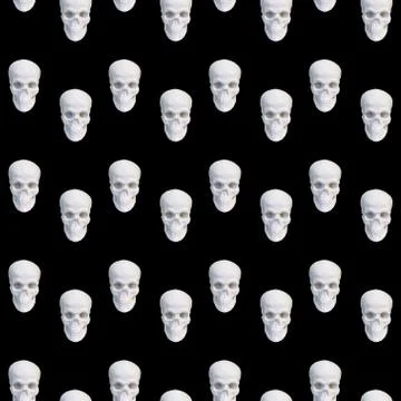 Contemporary collage. Seamless pattern of white skulls on a black background. Stock Photos