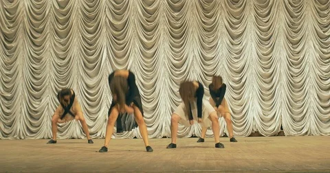 Contemporary dance performance of dancers on the stage. Front view. Stock Footage 79619258