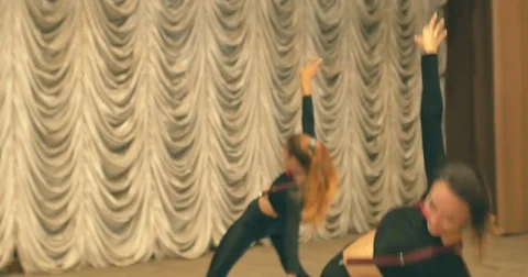 Contemporary dance performance of dancers on the stage. Front view. Stock Footage 79620114