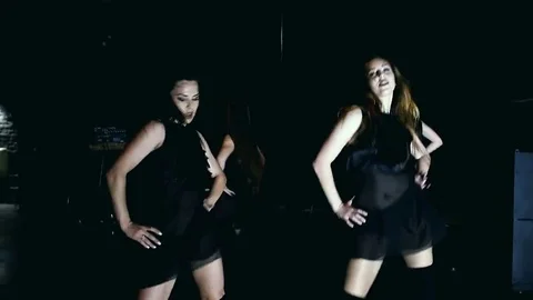 Contemporary dance performance of four dancers on dark Stock Footage 69224035