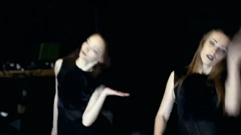 Contemporary dance performance of four dancers on dark Stock Footage 69225192