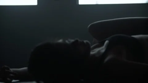 Contemporary dancer lying on back dancing on floor reaching out 스톡 동영상 104268835